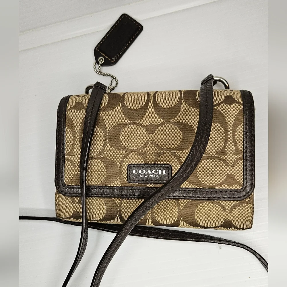 Coach Avery Signature Brown & Cream Wallet Crossbody Bag with Flap Closure